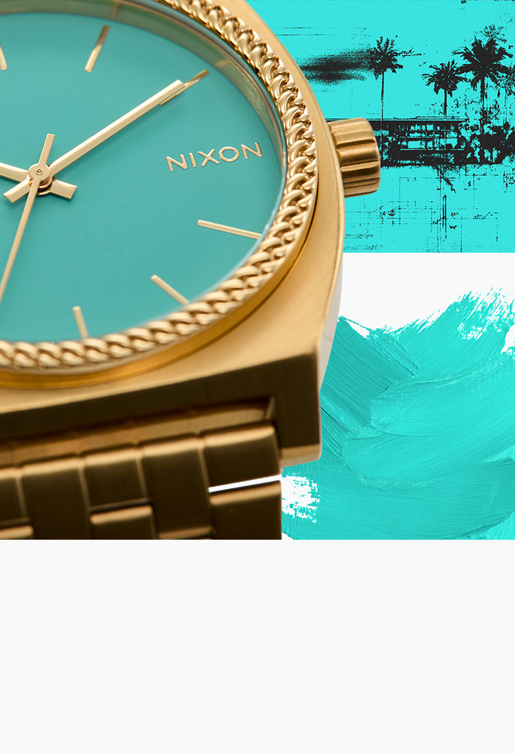 Gold Nixon watch with turquoise face on a colorful background